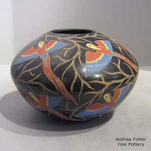 Polychrome jar with sgraffito and painted bird and branch design