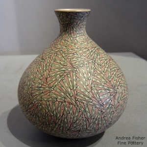 Geometric design on a polychrome jar with a narrow neck