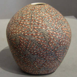 Black and red geometric designs on a seedpot