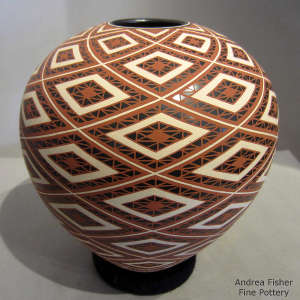 A diamond geometric design on a polychrome jar
