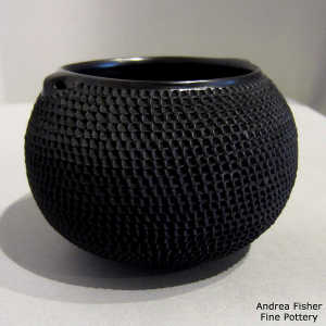 Textured surface on a black jar