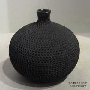 Corrugated surface on a thin-neck black jar