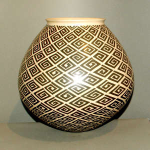 Geometric design on a black on tan jar