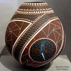 Bird, branch, sky and geometric design on a polychrome jar