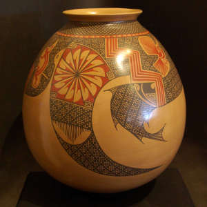 Mimbres animals and geometric designs on a polychrome jar