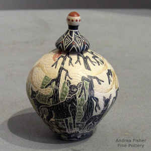 Sgraffito and painted wildlife and nature design on a miniature polychrome lidded jar