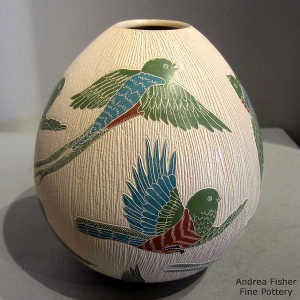 Sgraffito and painted bird design on a polychrome jar