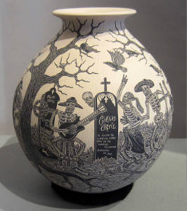 Sgraffito Day of the Dead motif on a black and white jar