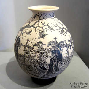 Sgraffito Day of the Dead motif on a black and white jar