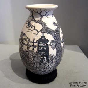 Sgraffito Dyay of the Dead motif on a black and white jar