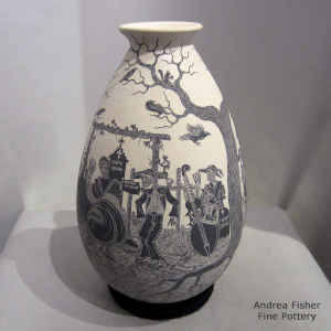 Sgraffito Day of the Dead motif on a black and white jar