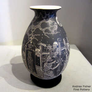 Sgraffito Night of the Dead motif on a black and white jar