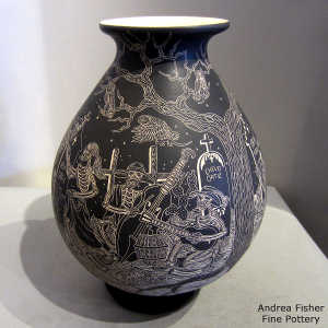 Sgraffito Night of the Dead motif on a black and white jar