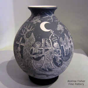 Sgraffito Night of the Dead design on a black and white jar