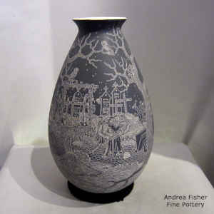 Sgraffito Night of the Dead motif on a black and white jar