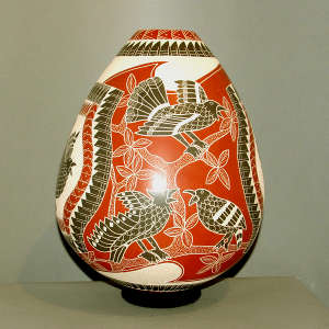 Bird, branch and geometric design on a polychrome jar