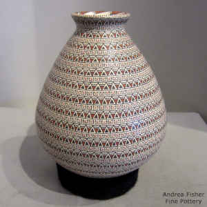 Bands of geometric design on a polychrome jar