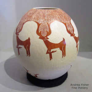 Red and white jar with sgraffito deer and geometric design