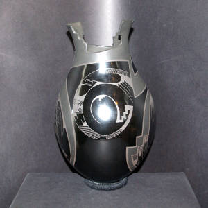 Kiva step organic opening on a black on black on black vase