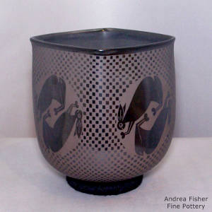 Rabbit and geometric design on a square black on black jar