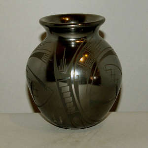 Geometric design on a black on black jar