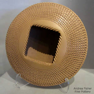 Corrugated brown flying saucer jar