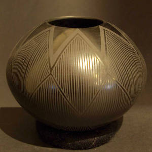 Geometric design on a black on black jar