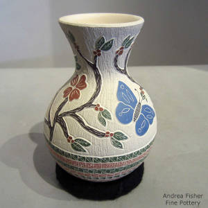 Sgraffito and painted nature motif on a polychrome jar