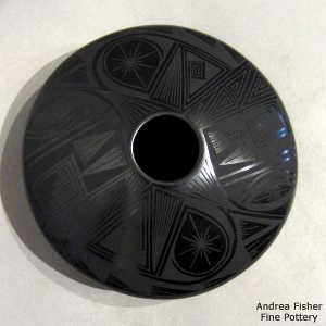 Paquime shard and geometric design on a black on black flying saucer jar