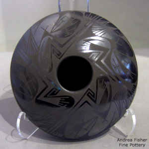 Geometric design on a black on black jar