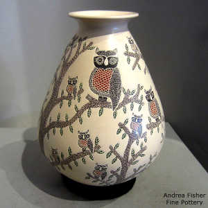 Sgraffito and painted owl and branch motif on a polychrome jar