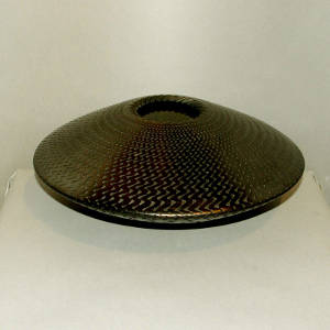 Corrugated surface on a graphite black flying saucer jar