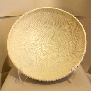 Textured surface on a large white bowl
