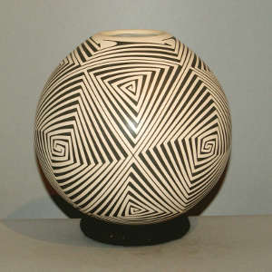 Geometric design on a black on tan jar