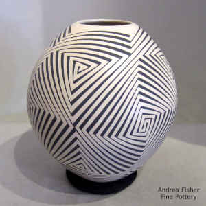 Brown geometric design on a tan jar