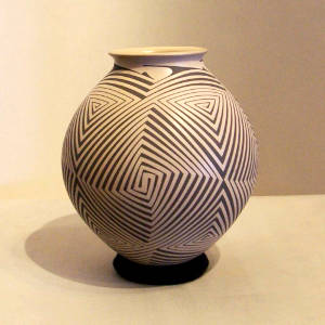 Black geometric design on a gray jar