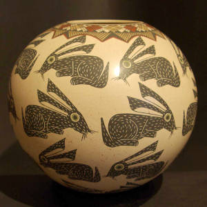 Rabbits and Paquime geometrics design on a Beige jar