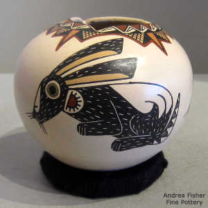 Rabbit and geometric design on a polychrome jar with a geometric opening