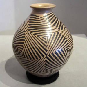 Black geometric design on a brown jar