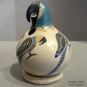 Sgraffito and painted parrot motif on a polychrome parrot effigy