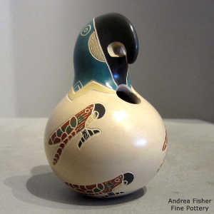 Sgraffito and painted parrot design on a polychrome parrot effigy