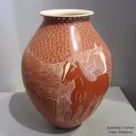 Red-on-white jar with a sgraffito horse and mesh design