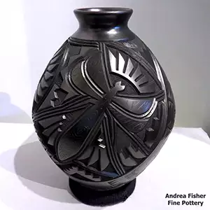 Black jar with a carved and sgraffito mosquito and geometric design