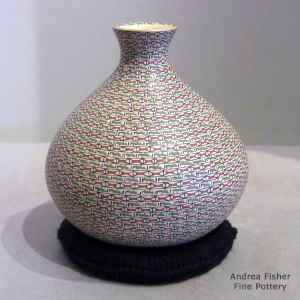 Geometric design on a polychrome thin neck vase