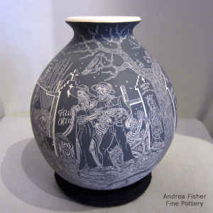 Sgraffito Night of the Dead motif on a black and white jar