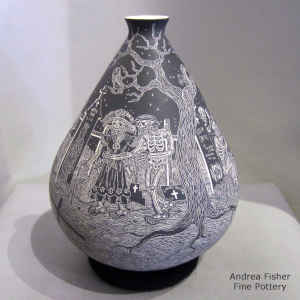 Sgraffito Night of the Dead motif on a black and white thin neck jar