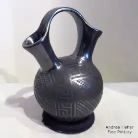 Black-on-black wedding vase with a geometric design