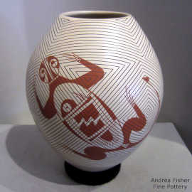 Terra cotta on white jar with a Paquime Revival lizard and geometric design