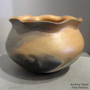 Fire clouds and a pie crust rim on a golden micaceous jar