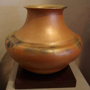 Fire clouds on a micaceous clay poy